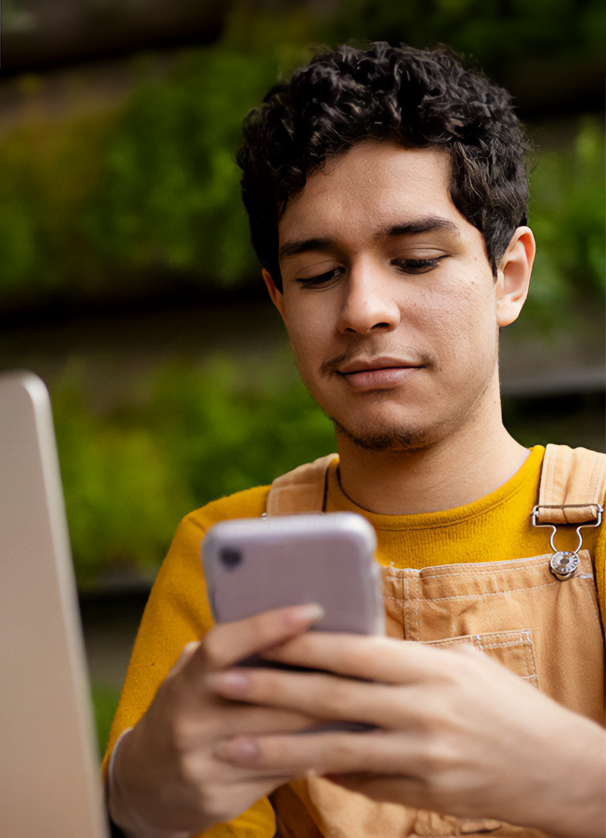 A man turns off the Bluetooth on his phone to help reduce the risk of bluejacking.