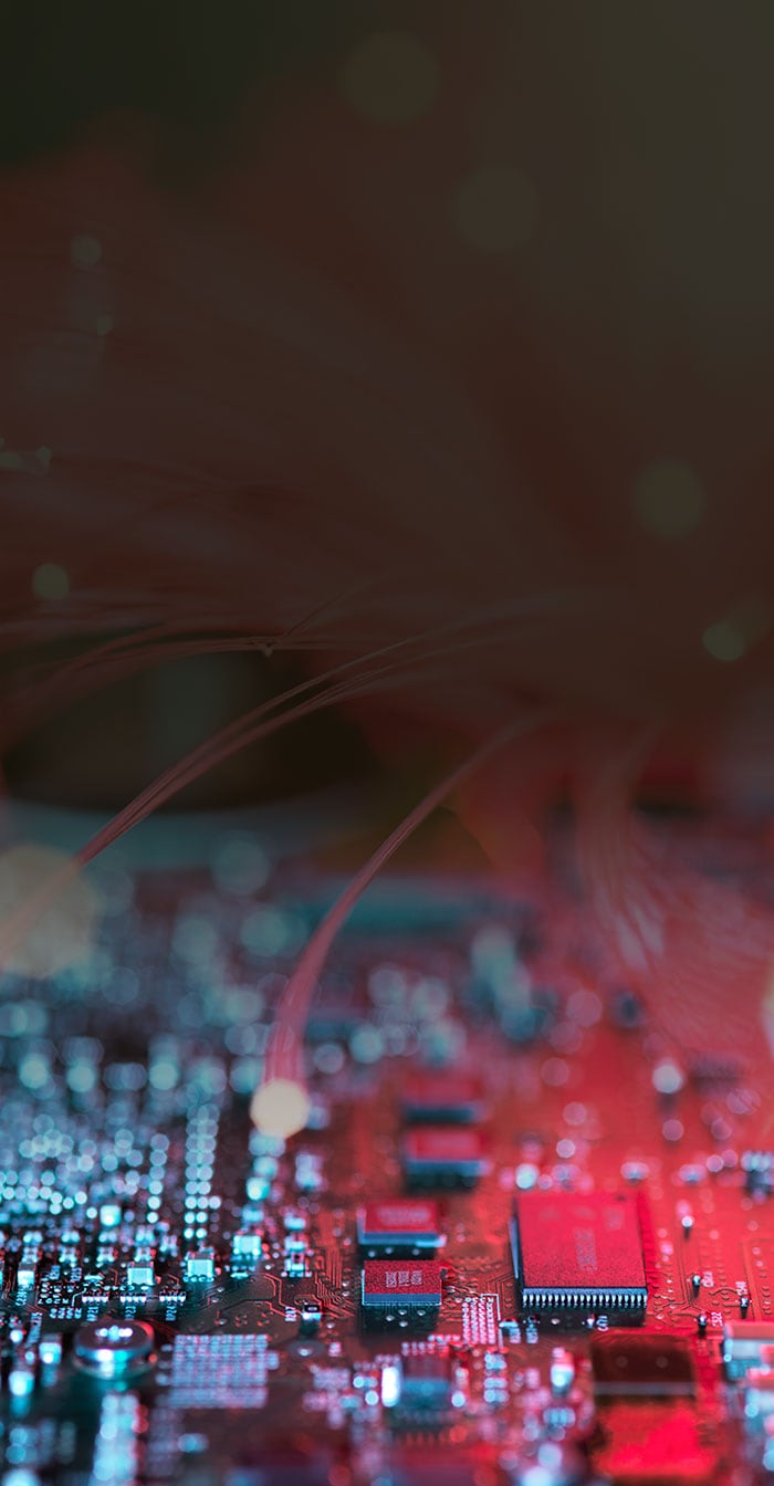 A glowing motherboard representing computer performance.