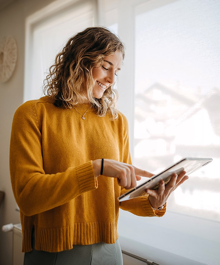 Woman researching what a VPN hides.