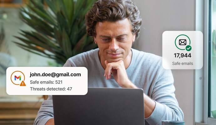 Email protection - a man working on his laptop.