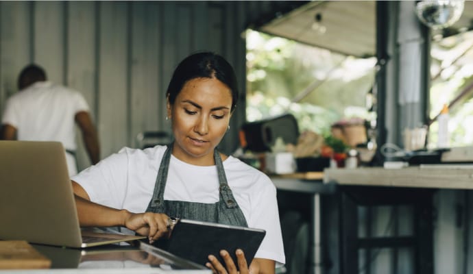 Woman looking at Tablet.